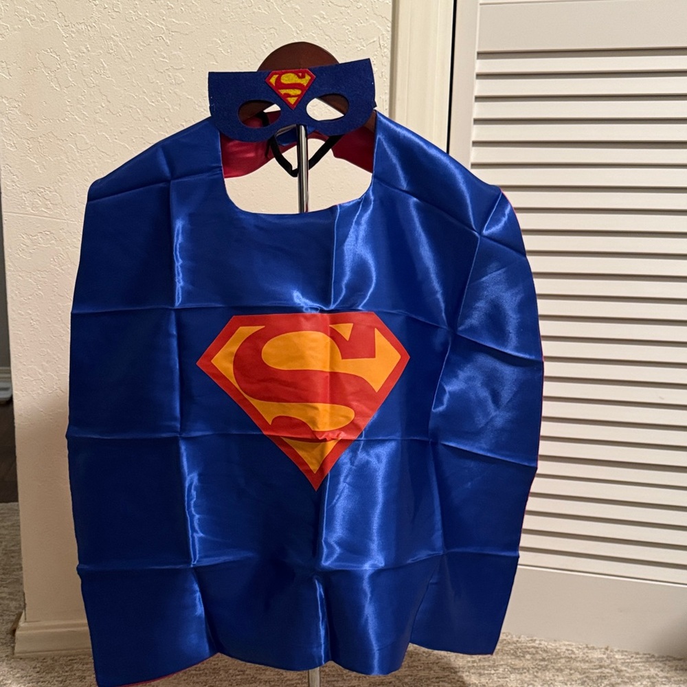 New. Superhero Blue/Red Kids Costume Set.  Reversible cape w/2 masks
